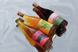 'The Wild Side' 3 Pack Group of Bottles on Reflective Background