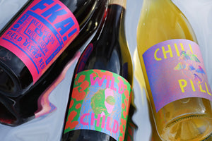 'Somewhere in the Middle' 3 Pack group of bottles on reflective background