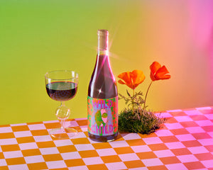 
                  
                    Load image into Gallery viewer, 2021 Perenti Vineyard &amp;#39;Wild Child&amp;#39; Old Vine Carignan on rainbow background with poppy flowers and glass
                  
                