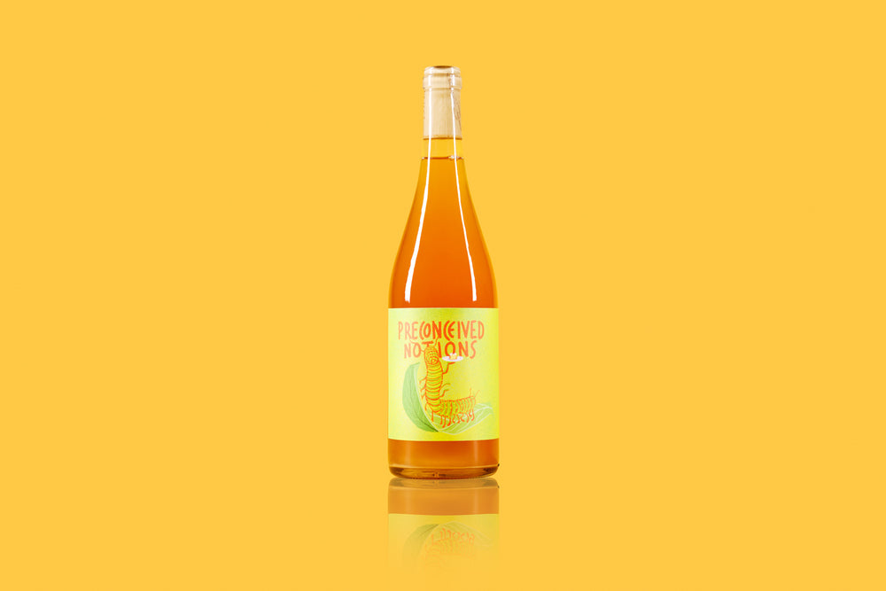 2022 Hartwick Vineyard ‘Preconceived Notions’ Skin-Fermented Muscat on yellow background
